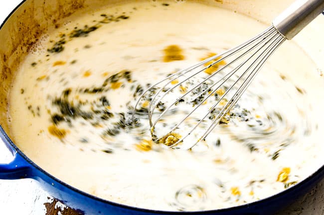showing how to make hommade cream of chicken soup for chicken divan by whisking together milk, chicken broth and seasonings