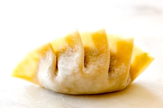 showing finished potsticker with pleats