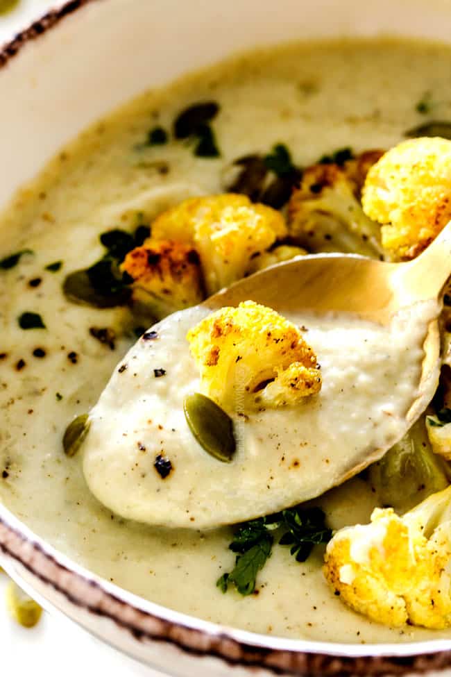 up close of a spoon of creamy Cauliflower Soup