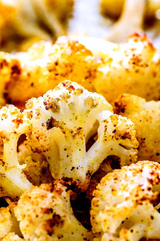 up close of a bunch of cumin roasted cauliflower with crispy ends