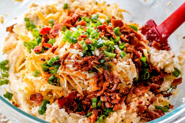 showing how to make twice baked potatoes by adding cheese, bacon and green onions to potato filling