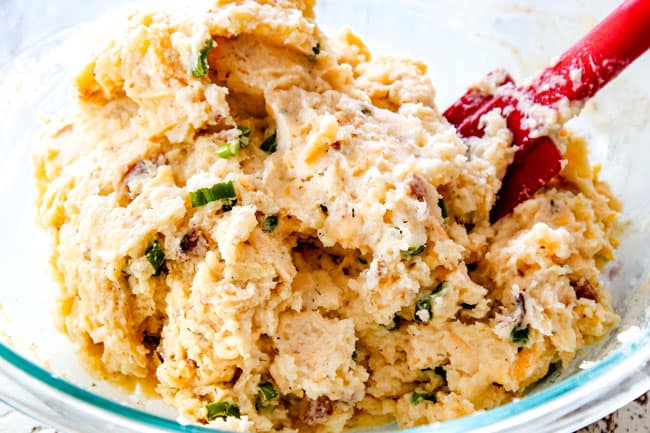 showing how to make twice baked potatoes by mixing all of the potato filling ingredients together