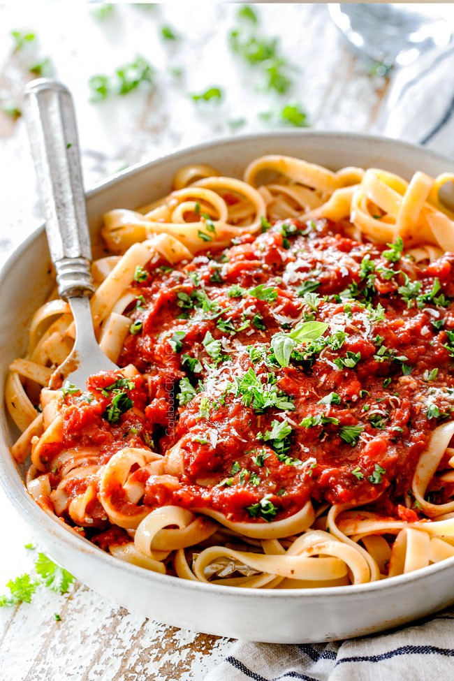 Hearty marinara sauce over pasta with Parmesan