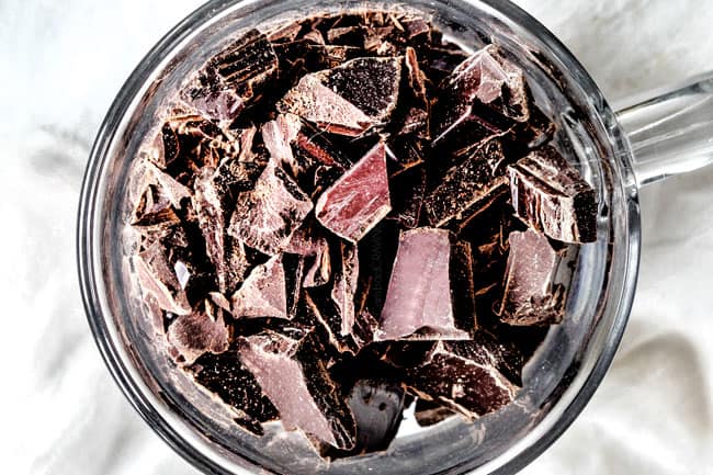 up close of chopped chocolate for chocolate ganache in microwave