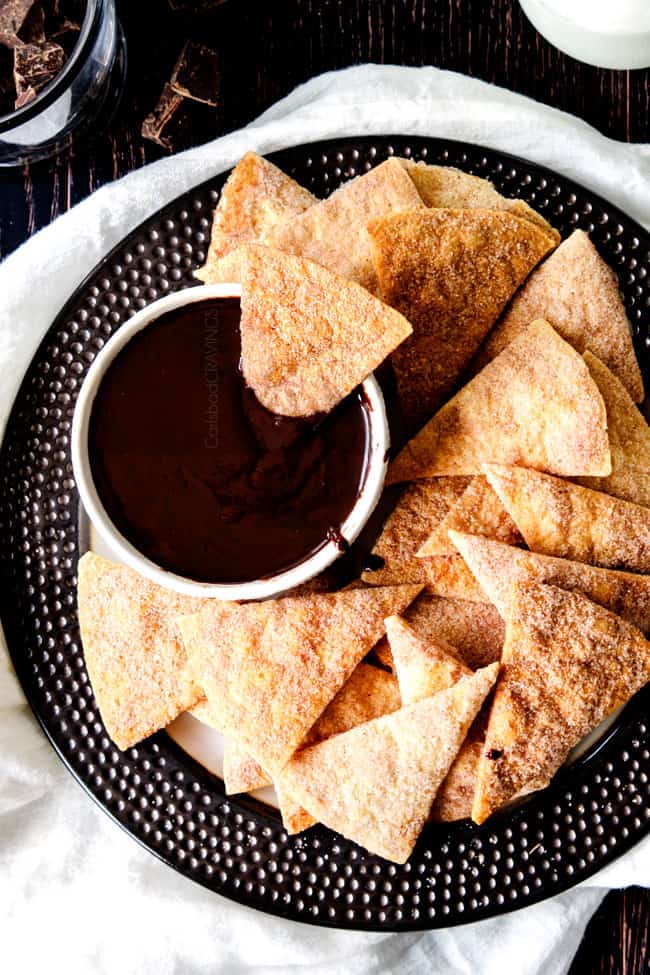 5 Minute Fool Proof Chocolate Ganache (sauce) is silky, creamy, sweet and 1,000 TIMES BETTER than any store bought chocolate sauce. Perfect for brownies, ice cream, cakes, popcorn, strawberries, etc best chocolate ganache in a bowl as a dip for cinnamon chips