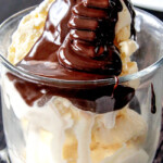 pouring chocolate ganache over ice cream like chocolate sauce