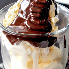 pouring chocolate ganache over ice cream like chocolate sauce