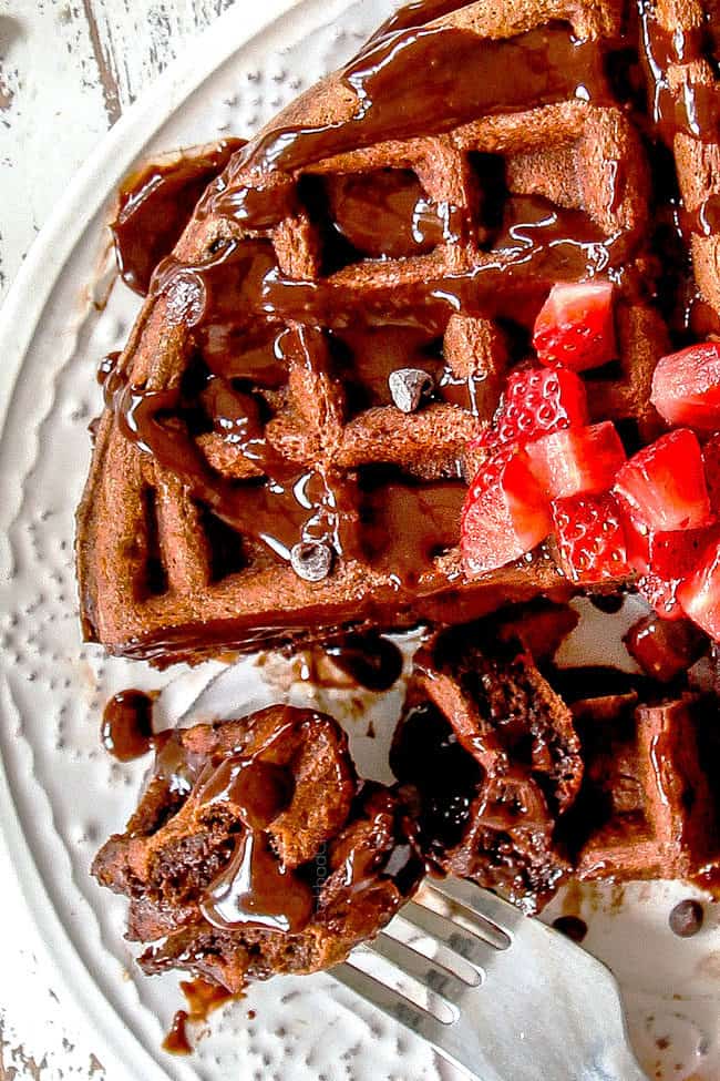 up close view of easy chocolate waffles with a bite on a fork