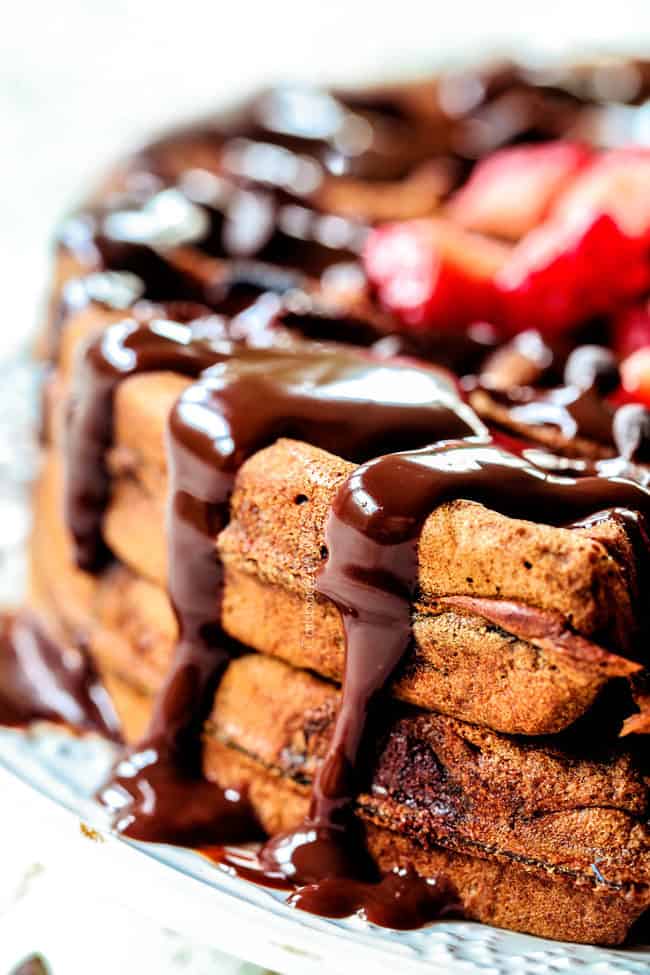 side view of easy chocolate waffles with chocolate sauce drizzled over the waffles