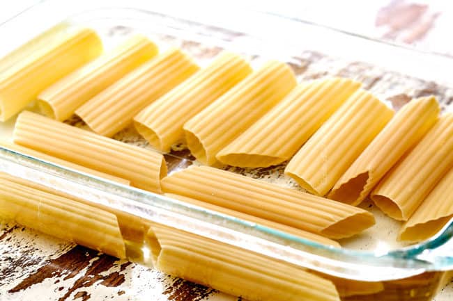 showing how to make manicotti by soaking manicotti shells