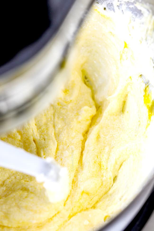 showing how to make Kentucky Butter Cake by blending eggs with sugar and butter