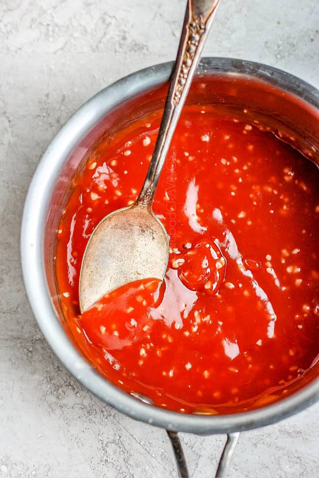 showing how to make cream cheese wontons by making dip for wontons