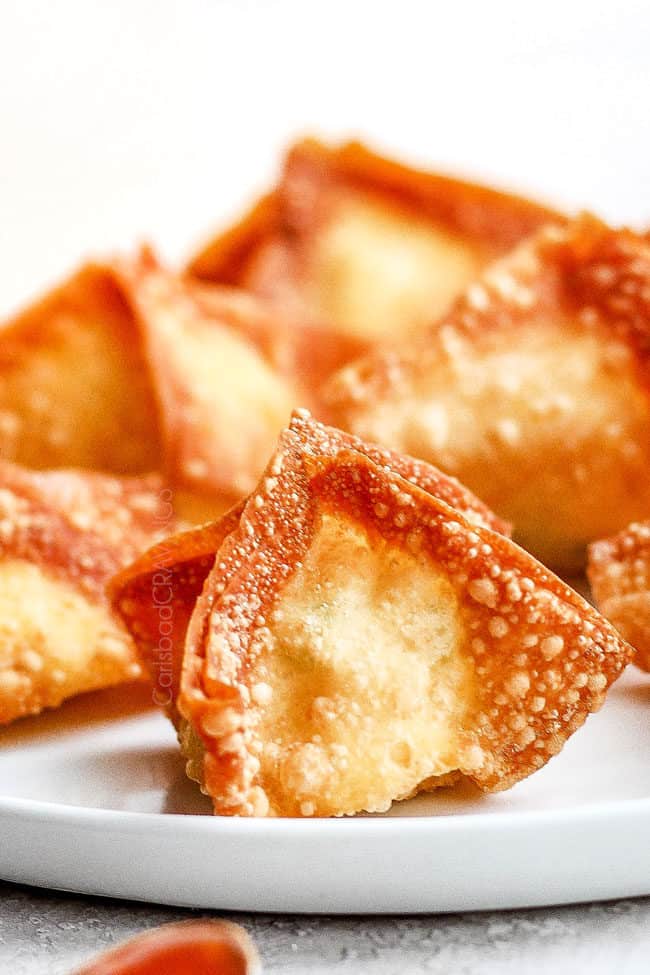 up close cream cheese wontons on a plate