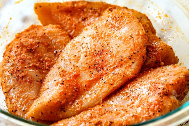 showing how to make lemon chicken by marinating chicken