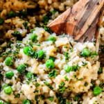showing how to make risotto by stirring cooked risotto rice