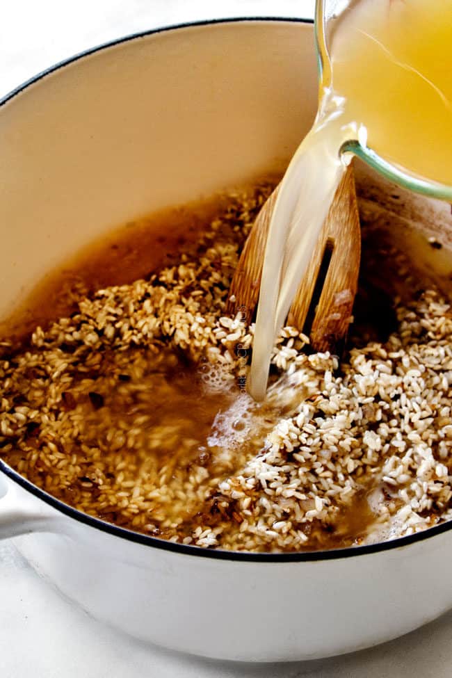 showing how to cook risotto by cooking garlic and shallots