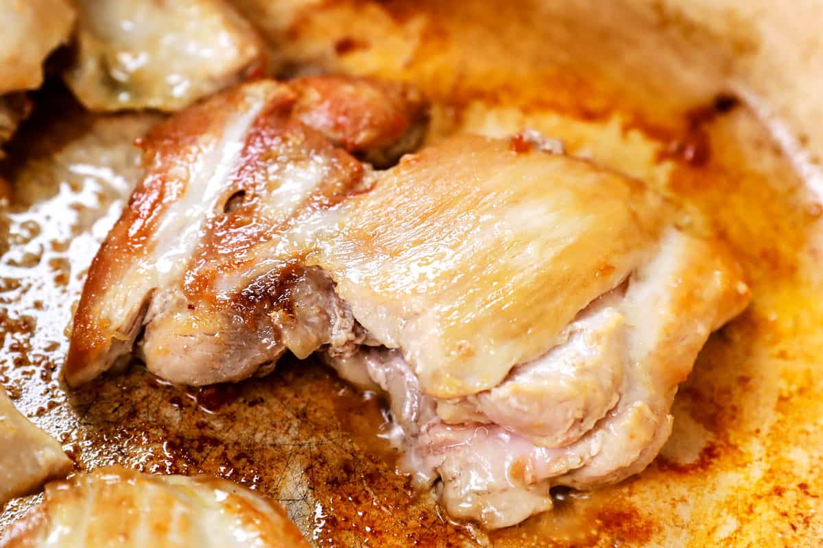 showing how to make Thai chicken soup by searing the chicken