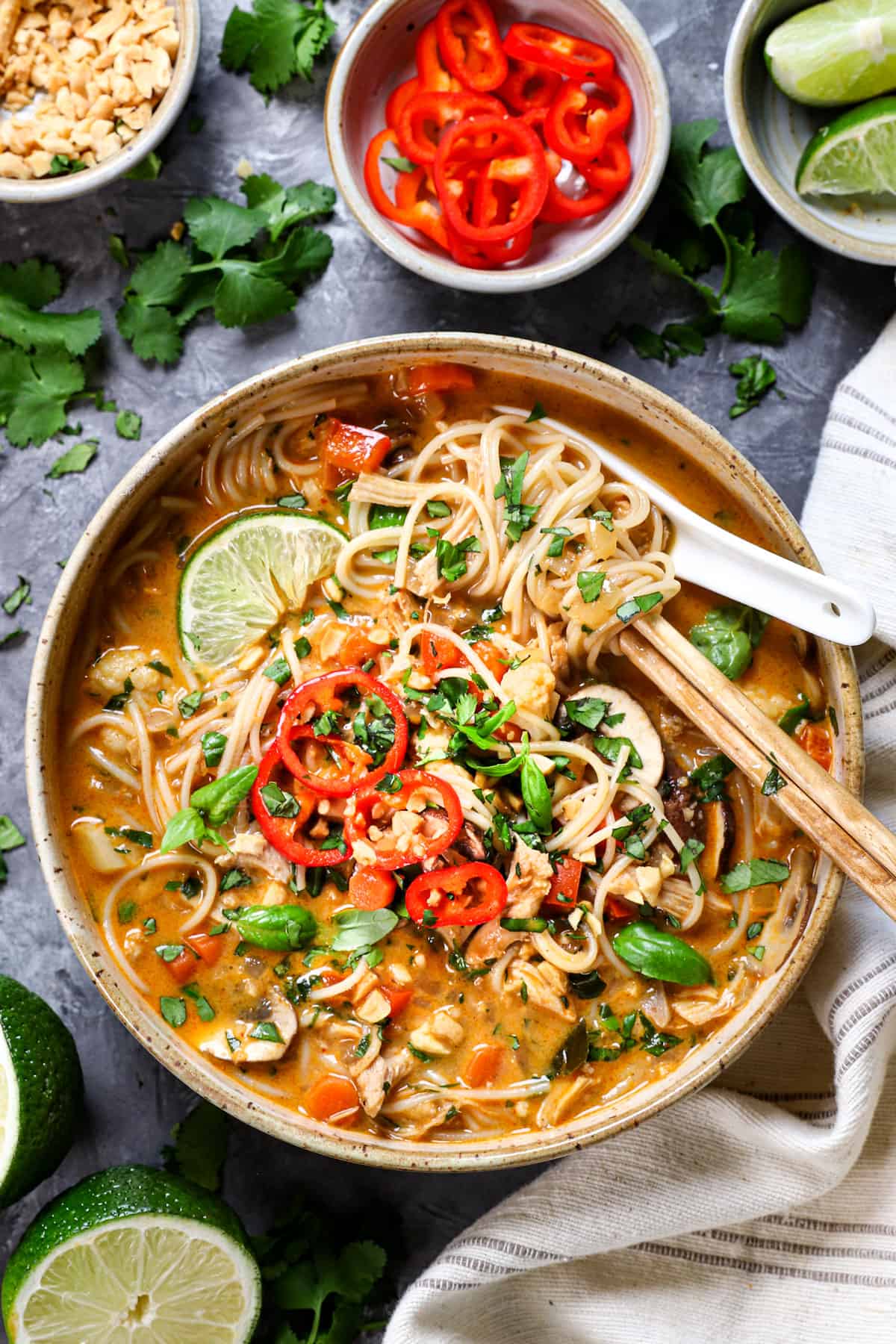 top view of Thai Chicken Soup in a bowl with noodles