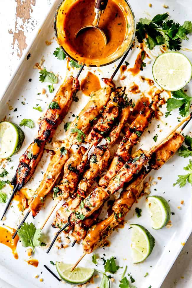 top view of grilled chicken satay with Thai peanut sauce