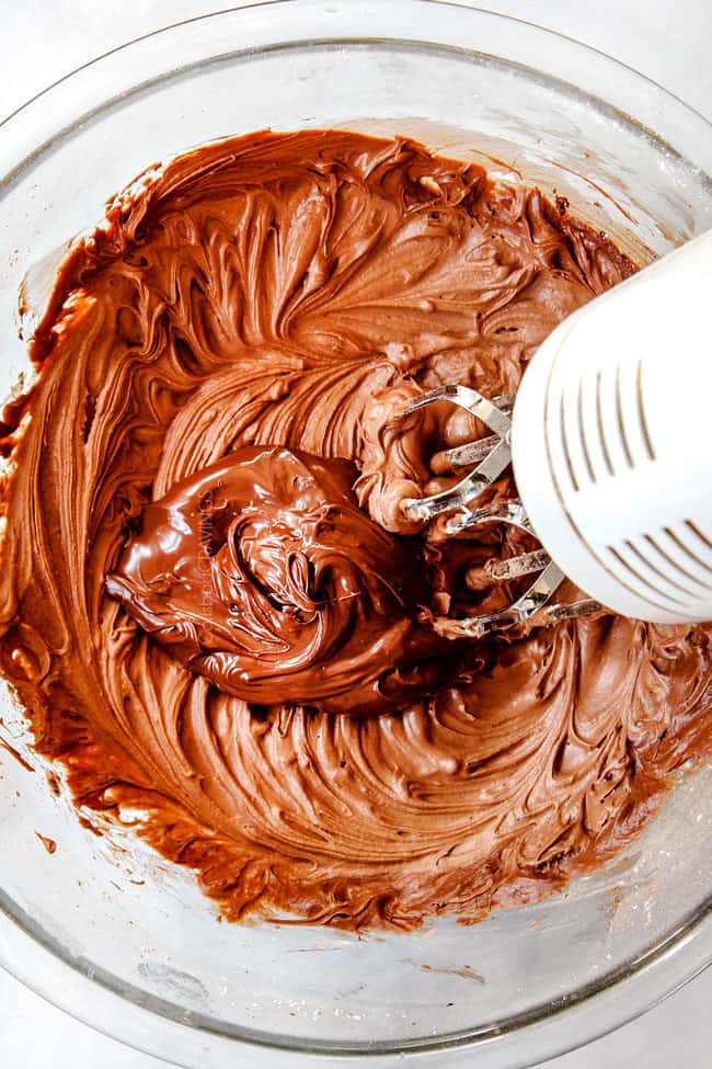 showing how to make banana cake by adding cream cheese and nutella tot a bowl
