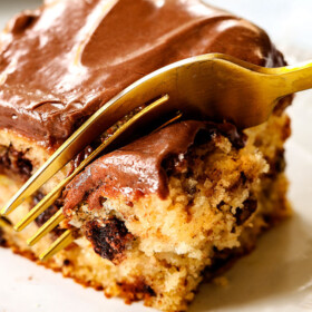 up close of a fork cutting into banana cake