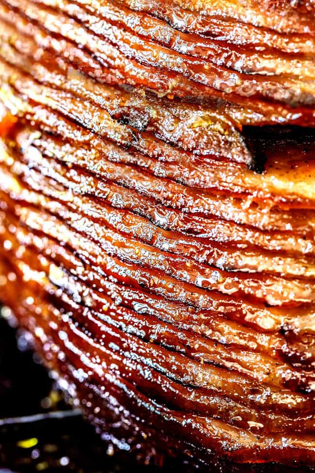 up close of honey baked ham with layers of slicces