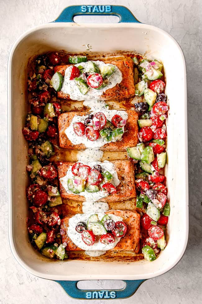 top view of baked salmon fillets with dill sauce for salmon