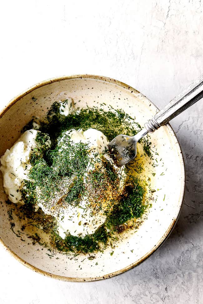 top view showing how to make dill sauce for salmon by adding dill sauce ingredients to a large bowl