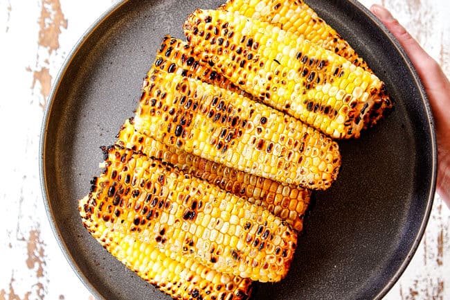 showing how to make corn salsa by grilling fresh corn on the cob