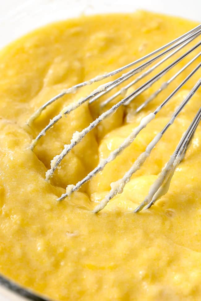 showing how to make strawberry shortcake cake by mixing butter, sugar and eggs together in a glass bowl