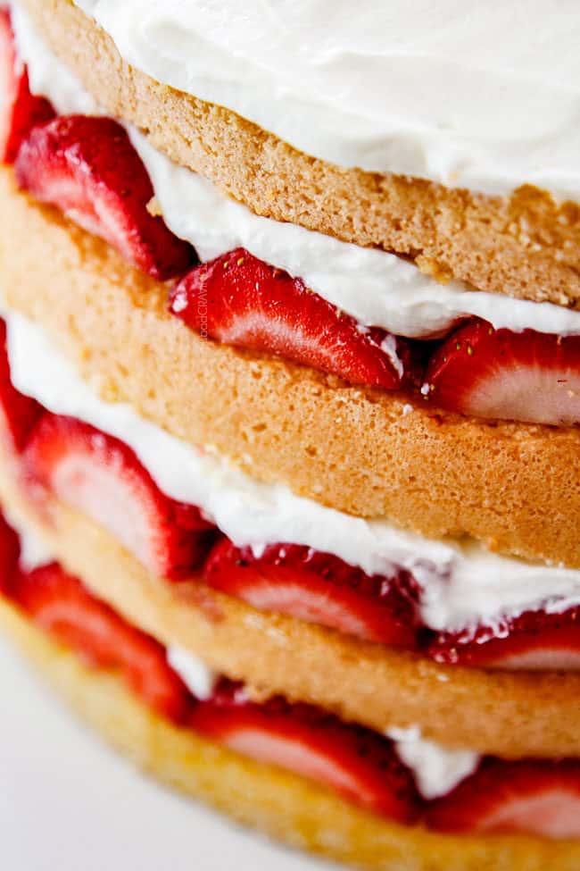 up close of layers of the best strawberry shortcake cake