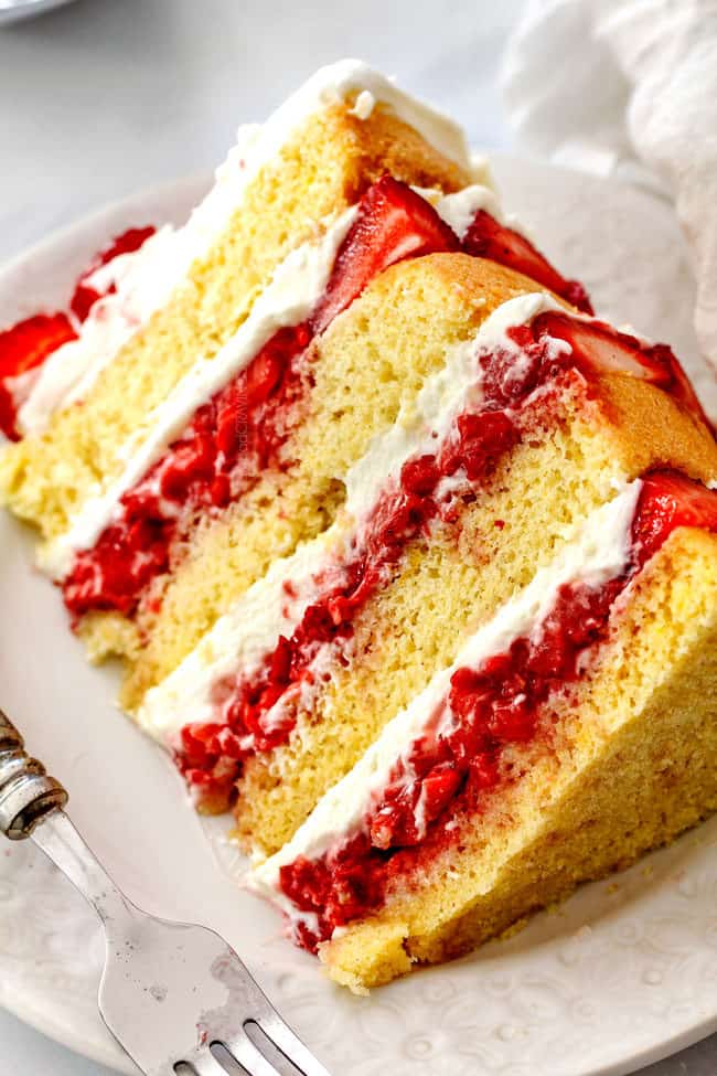 up close of a slice of the best strawberry shortcake cake recipe from scratch