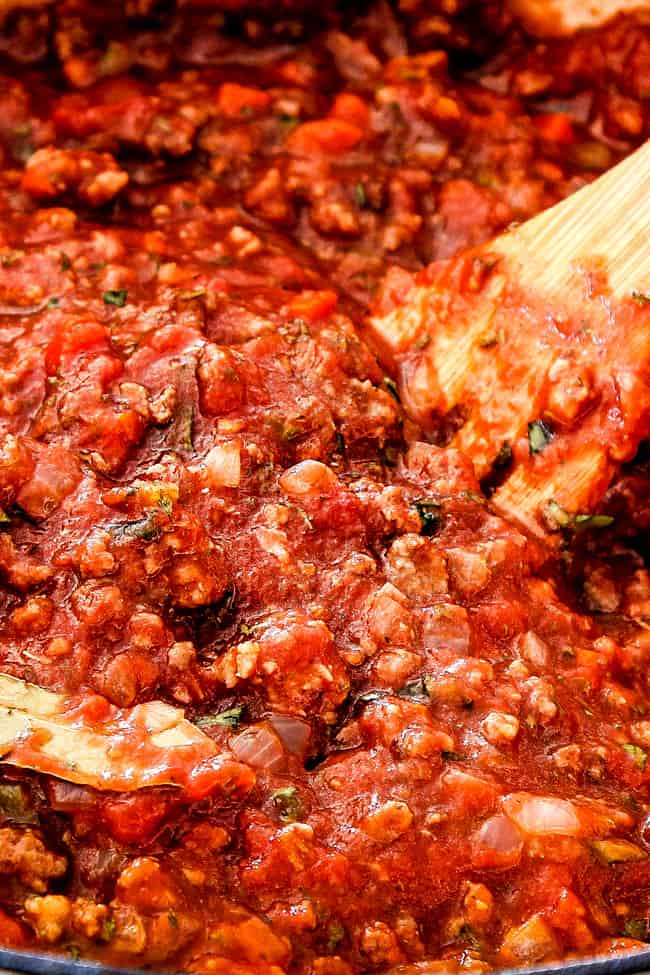showing how to make the traditional bolognese sauce by simmering reduced