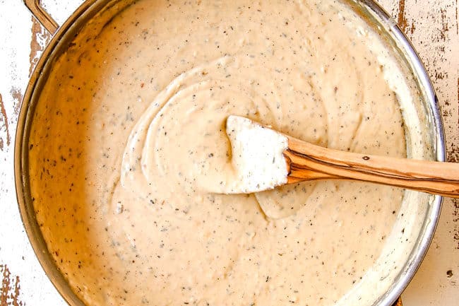 showing how to make chicken lasagna by making Alfredo sauce from starch