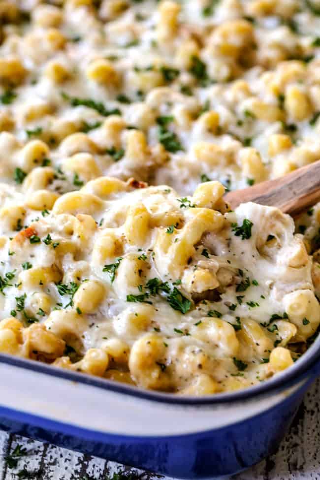 scooping up easy Chicken Alfredo recipe