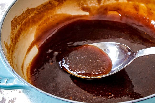 showing how to make yakitori by thickening yakitori sauce in a saucepan