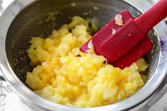 showing how to make hummingbird cake by draining pineapple