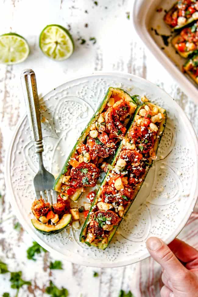 a plate showing how to serve stuffed zucchini boats