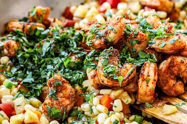 showing how to make stuffed zucchini boat recipe by adding cilantro and lime juice to filling