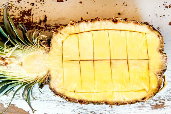 showing how to hollow out pineapple to make a pineapple boat to serve pineapple fried rice