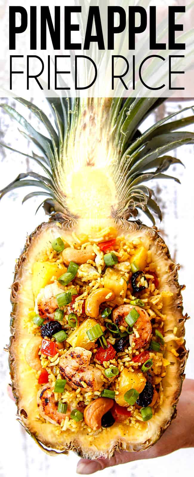 top view of pineapple fried rice in a hollowed out pineapple bowl