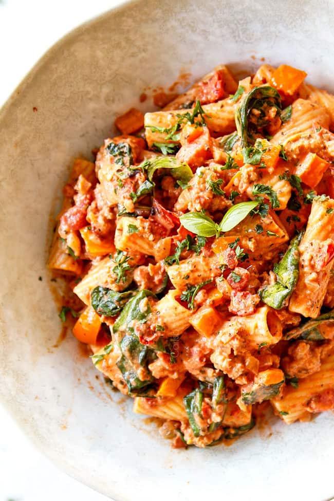 rigatoni pasta in white bowl