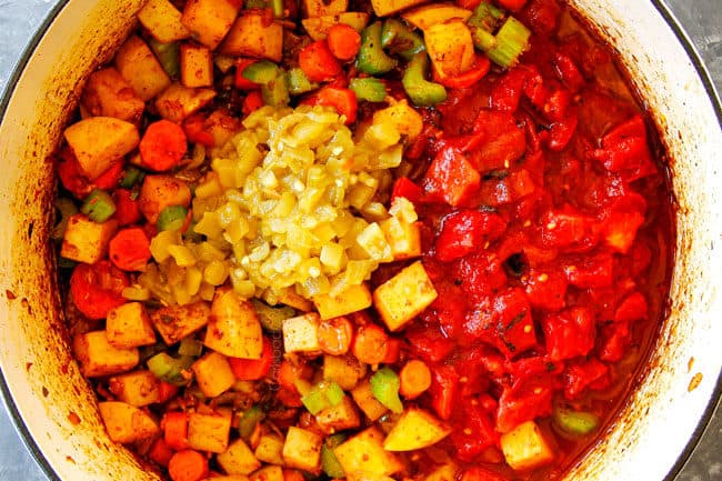showing how to make Albondigas Soup by adding green chiles and tomatoes to veggies