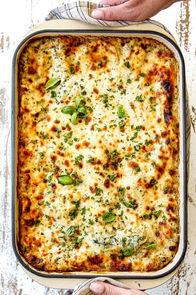 top view of chicken Alfredo Lasagna coming out of the oven