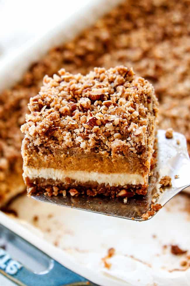 up close of a slice of creamy pumpkin cheesecake bars recipe