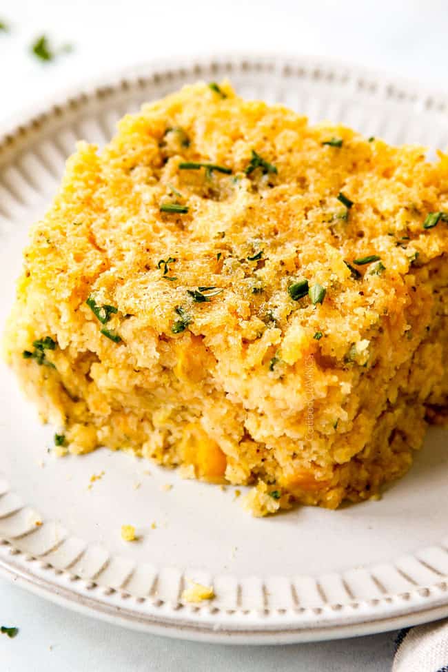 up close of a slice of easy corn casserole on a plate