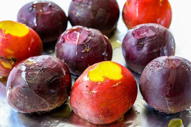 showing how to make beet salad by roasting beets in foil drizzled with olive oil
