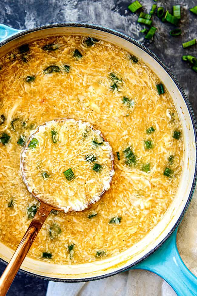 top view of a ladle full easy Egg Drop Soup recipe