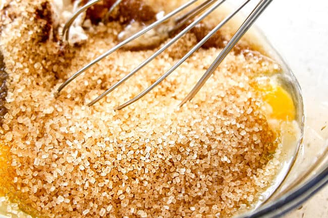 showing how to make Pear Pie by whisking custard filling ingredients together