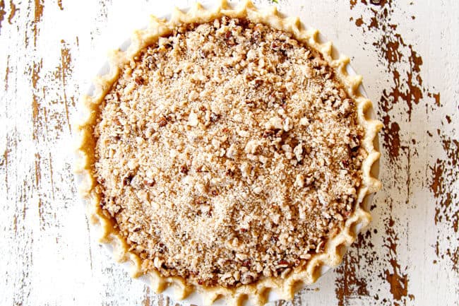 showing how to make Pear Pie by adding crumble topping